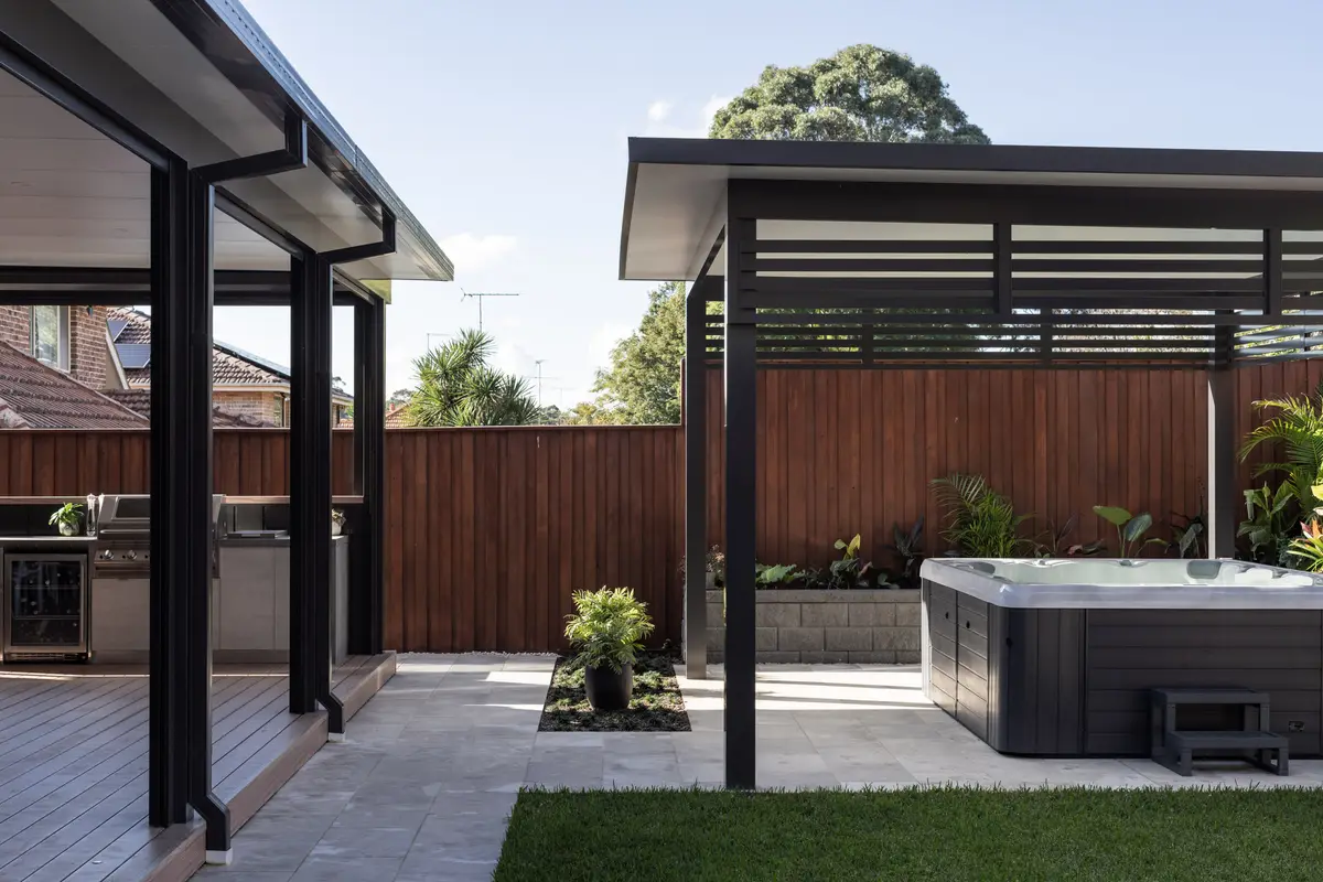 The paved courtyard between the covered alfresco and the freestanding cabana, Castle Hill
