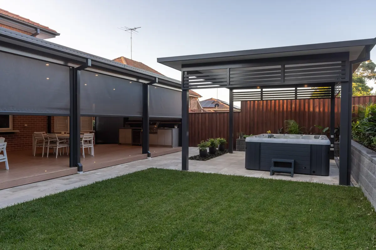 Pergola with lighting and clad walls