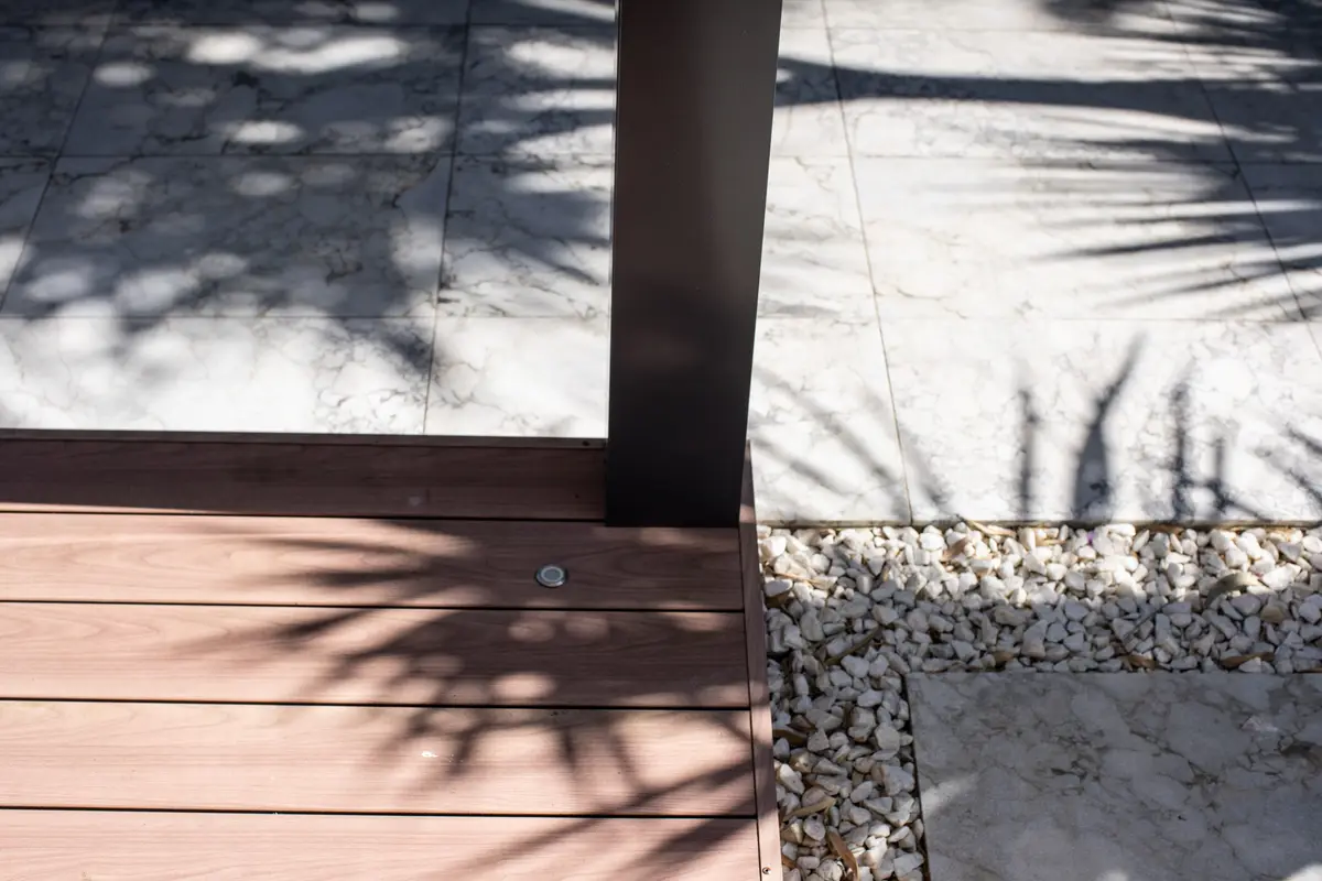 LED deck lights illuminating the deck surface and stairs at night