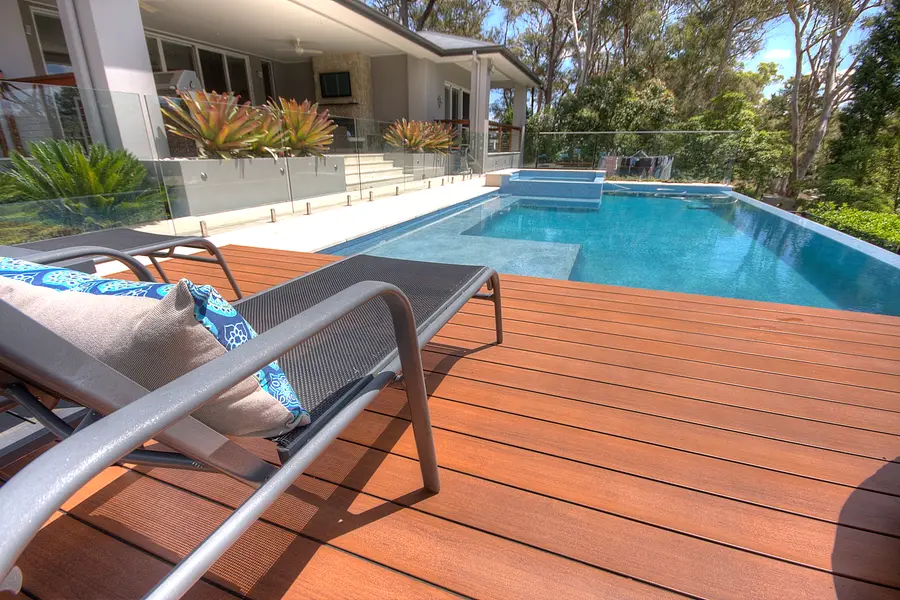 The deck and pool seen together from the far corner of the garden