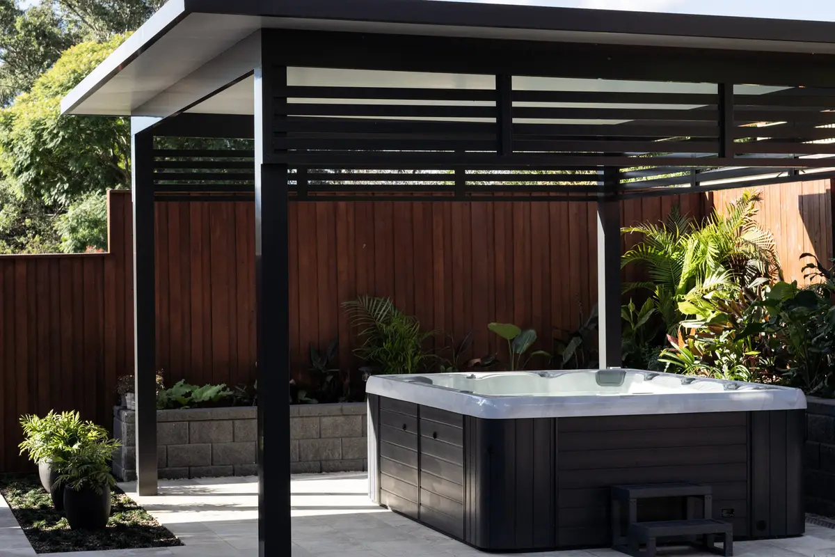 Freestanding insulated cabana over the swim spa with aluminium slat screening above, Castle Hill