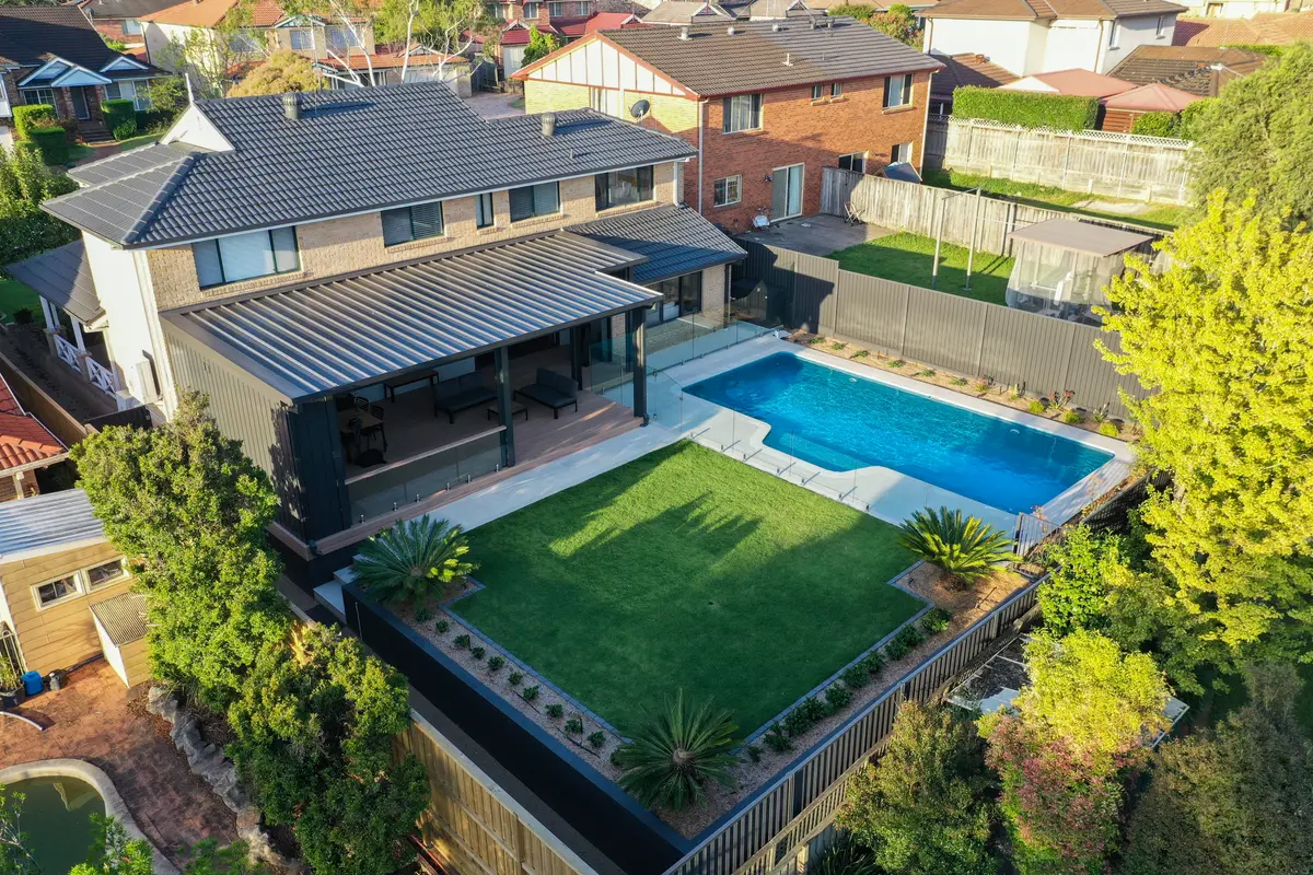 The pergola, deck, lawn and pool from above, filling the rear of the block, Dural