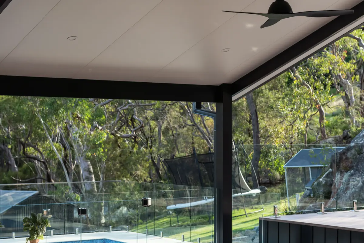 Raked insulated ceiling and exposed black beams over the deck, Galston
